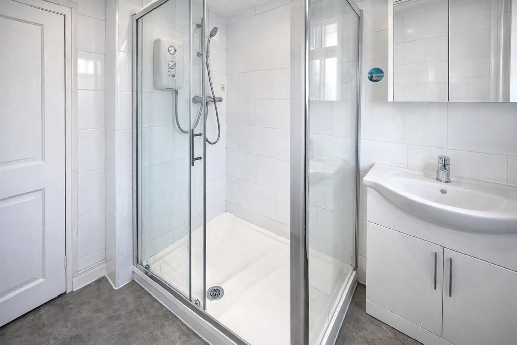 Modern bathroom with glass shower enclosure