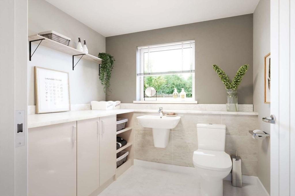 Large cloakroom with utility area for the...