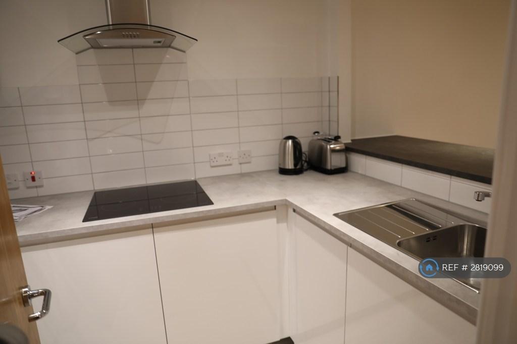 Kitchen With Hob, Dishwasher And Other White Goods
