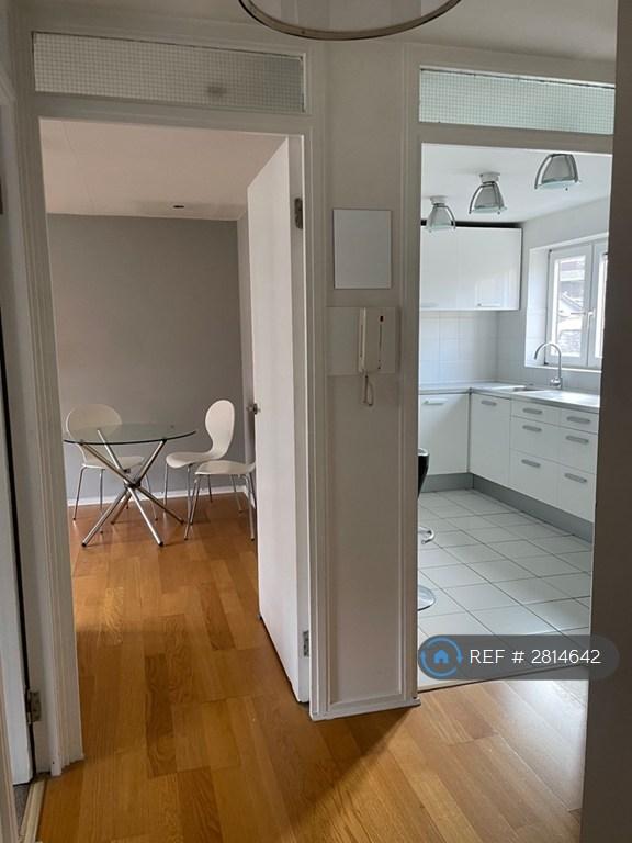 View Of The Kitchen And Reception From The Hallway