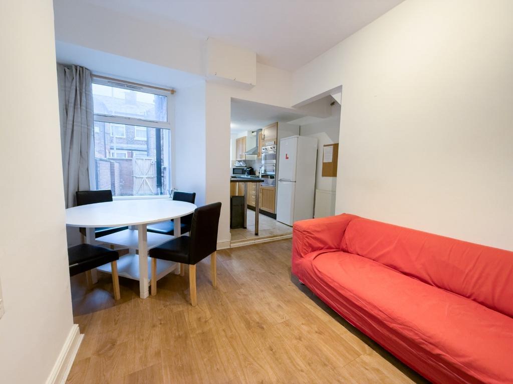 Bright lounge with dining table and sofa...