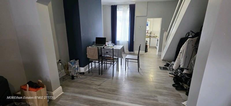 Bright open-plan living and dining area...