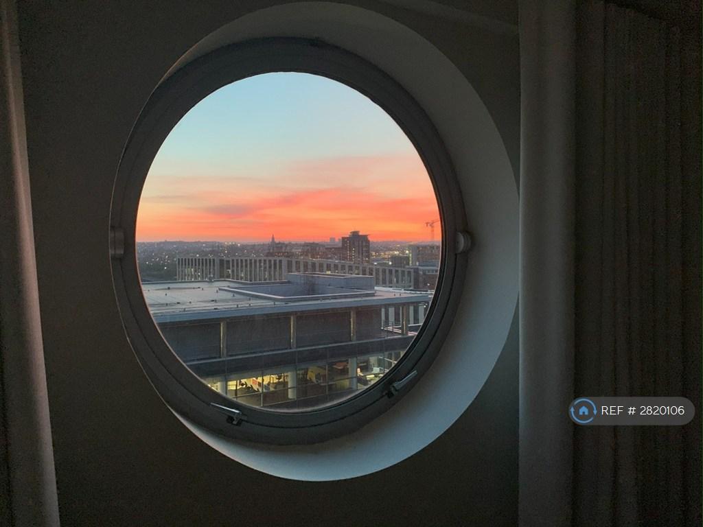 Sunset Through Round Window