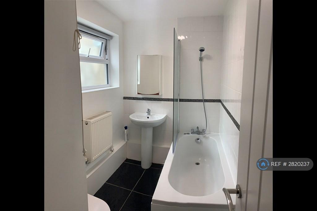 Bathroom With Over Bath Shower