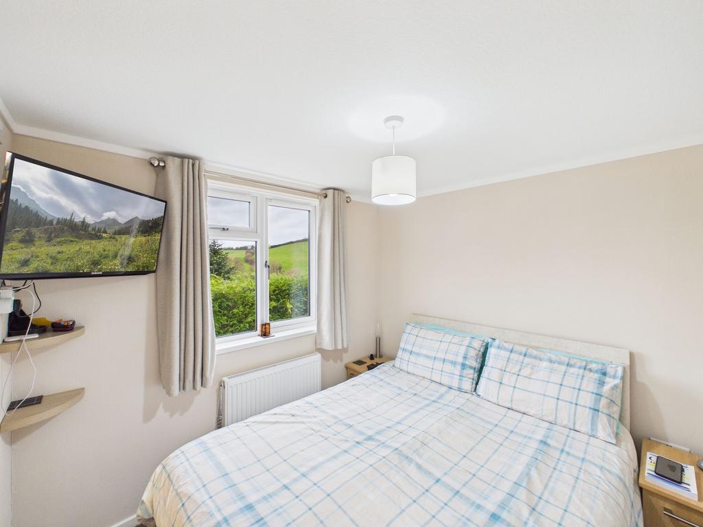Bedroom 1 with ensuite and walk in wardrobe.