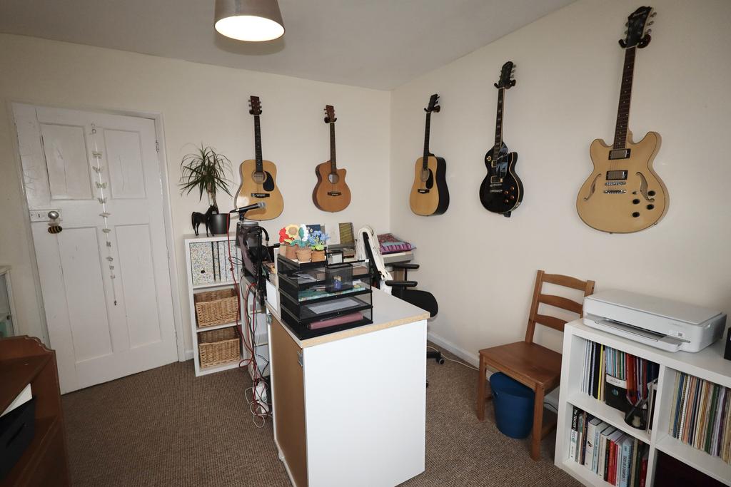 Bedroom two set up as a music studio