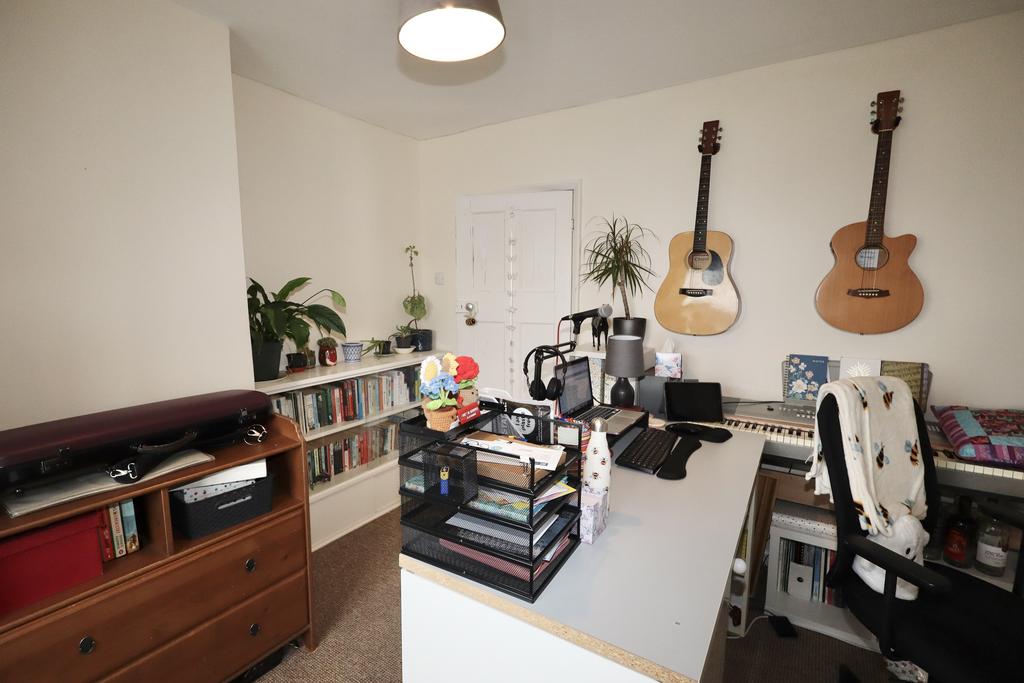 Bedroom two set up as a music studio