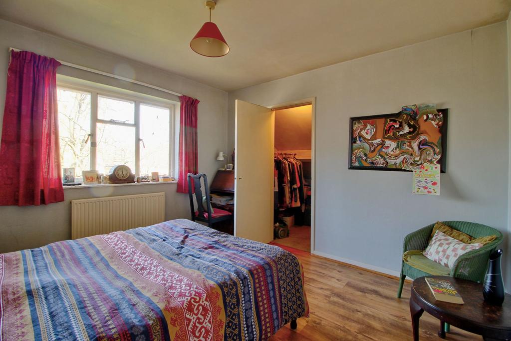 Bedroom One showing walk-in storage