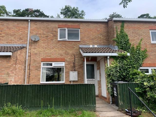 Terraced house with garden and covered entrance...