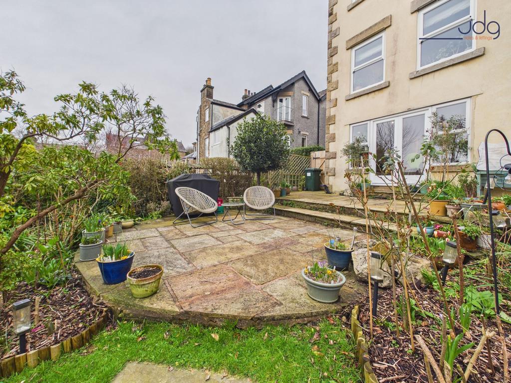 Mature landscaped garden with vegetable and...
