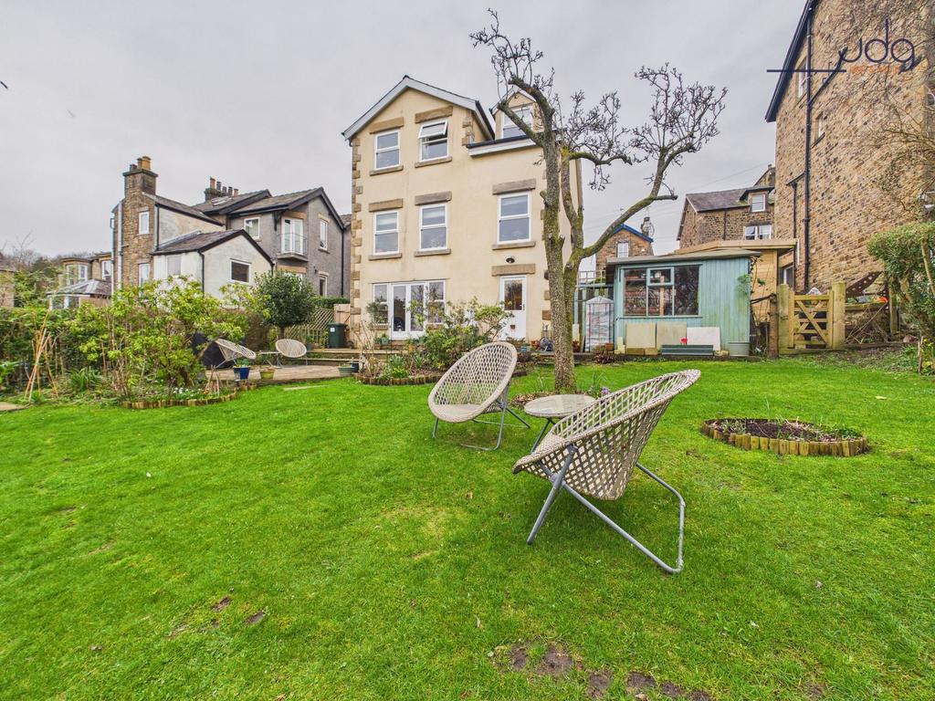 Mature landscaped garden with vegetable and...