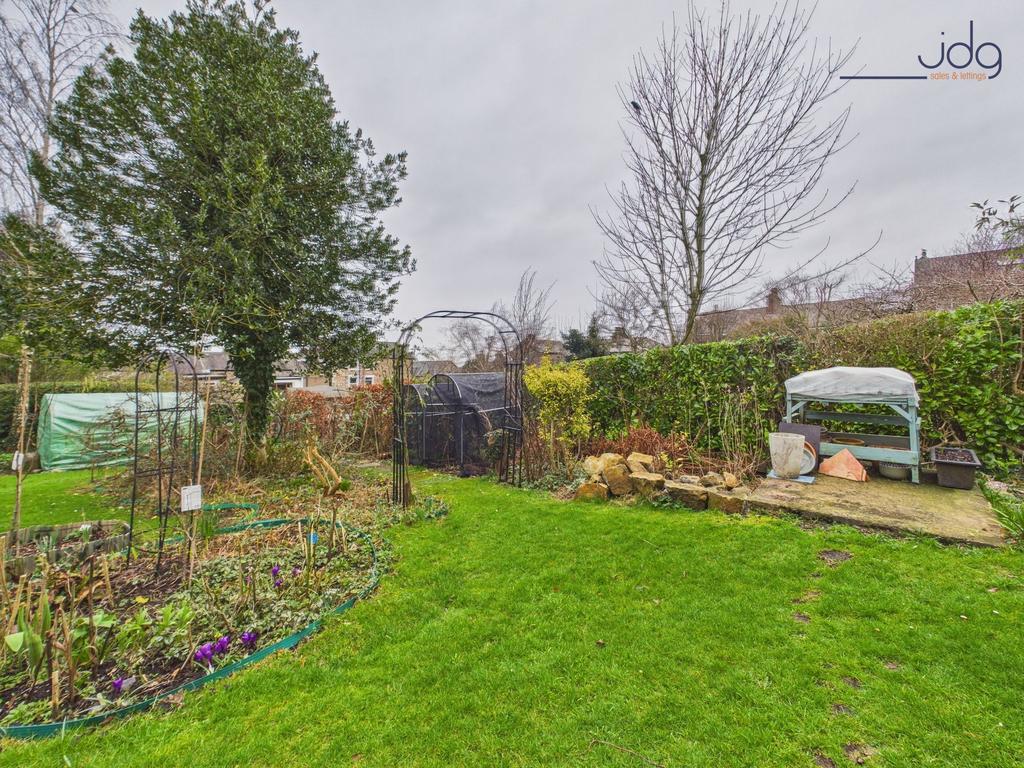 Mature landscaped garden with vegetable and...