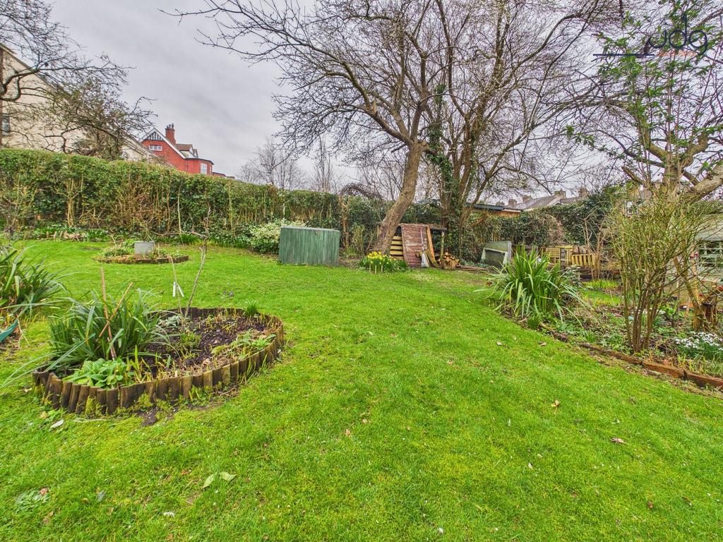 Mature landscaped garden with vegetable and...