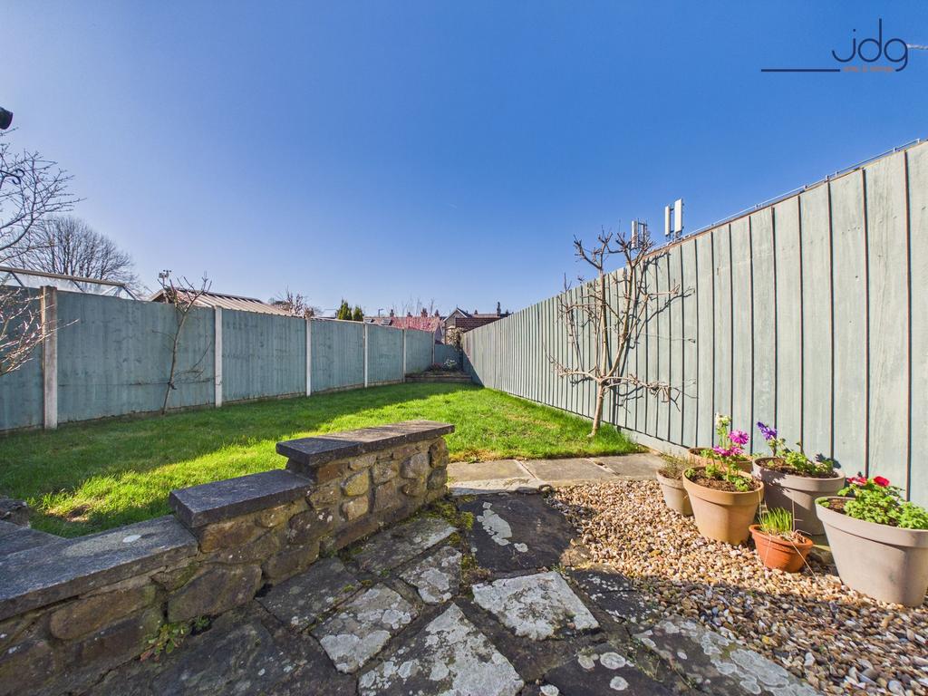 South-West facing Garden with a mixture of lawn...