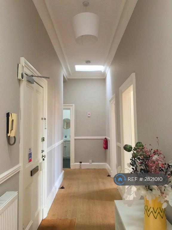 Large Corridor With 3 Large Cupboards