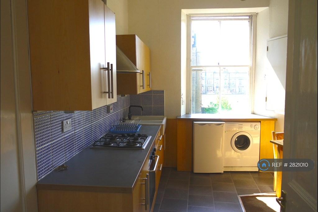 Stylish Kitchen With Dining Table &amp; Lounge Area