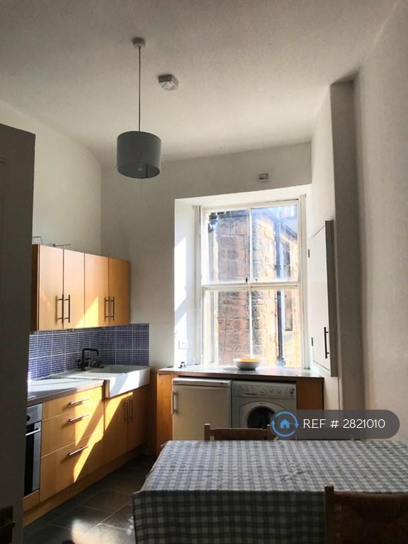 Stylish Kitchen With Dining Table &amp; Lounge Area