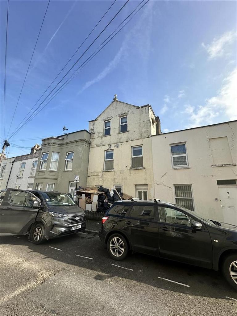 Terraced property with off-street parking and b...