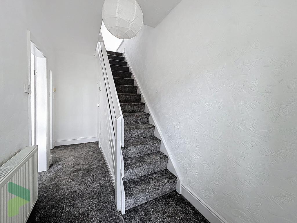 Hallway. Stairs to first floor