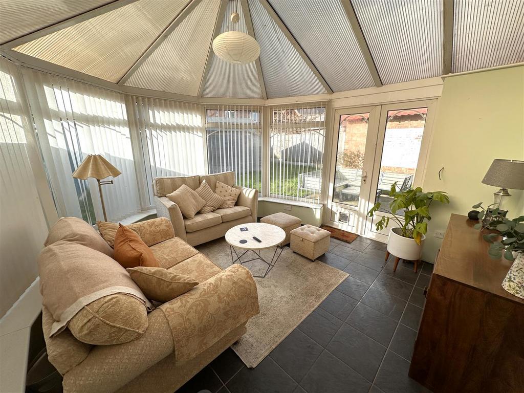 Generous Conservatory With French Doors  904