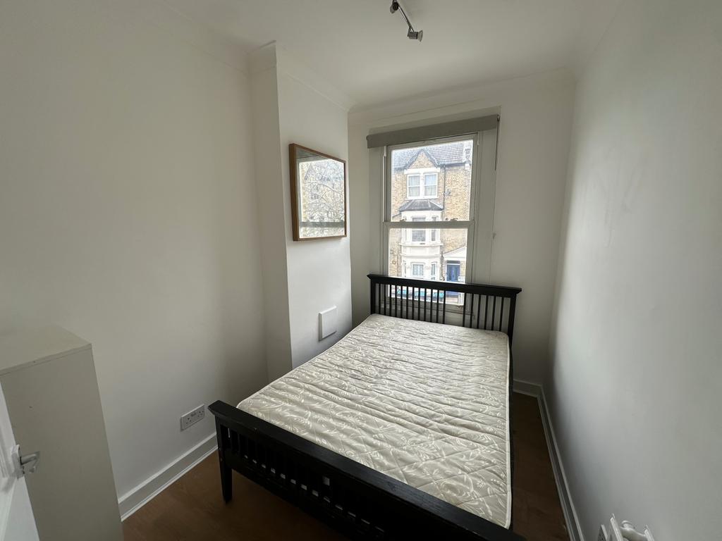 Bright room with window and fitted bed...