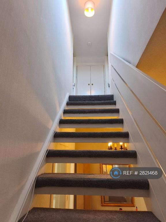 Staircase From The Hallway Up To The 2nd Floor
