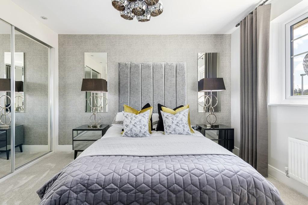 Bedroom two benefits from a private en suite