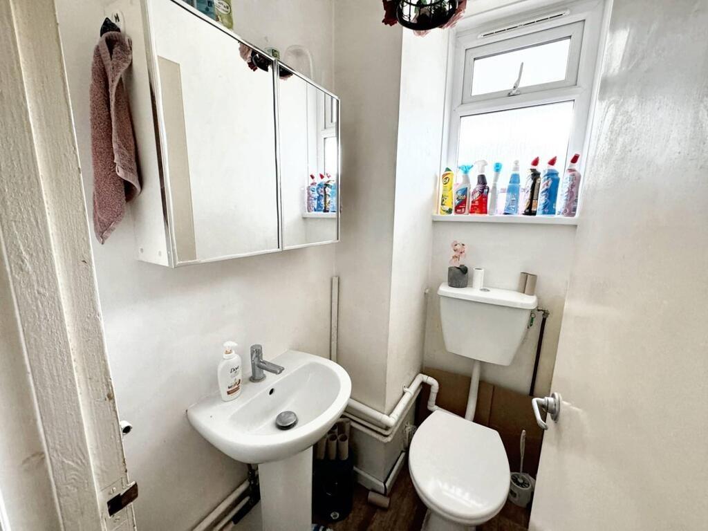 Bright compact bathroom with modern fixtures...