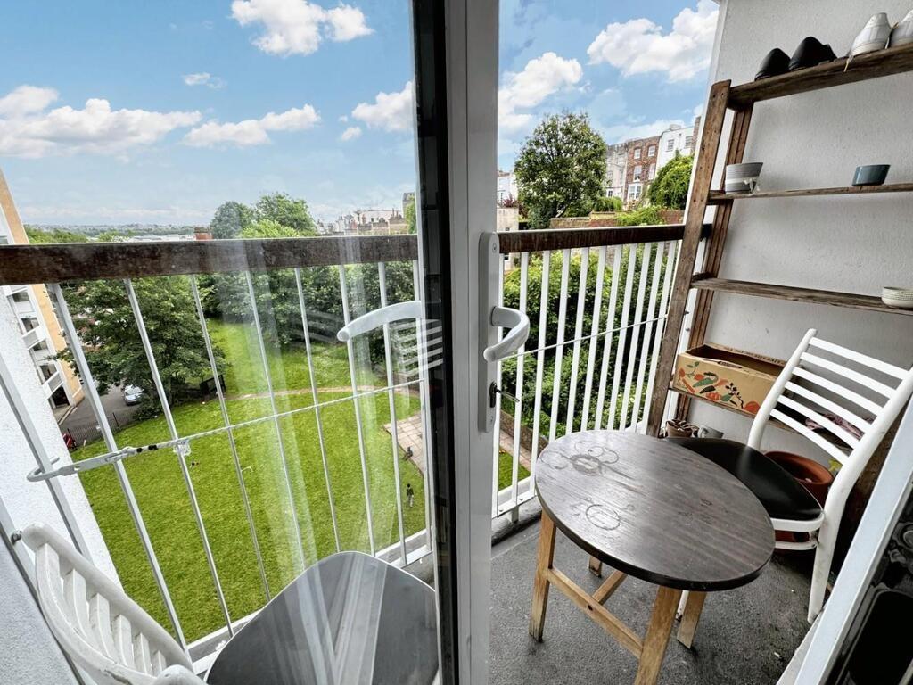 Sunny private balcony with grassy views...