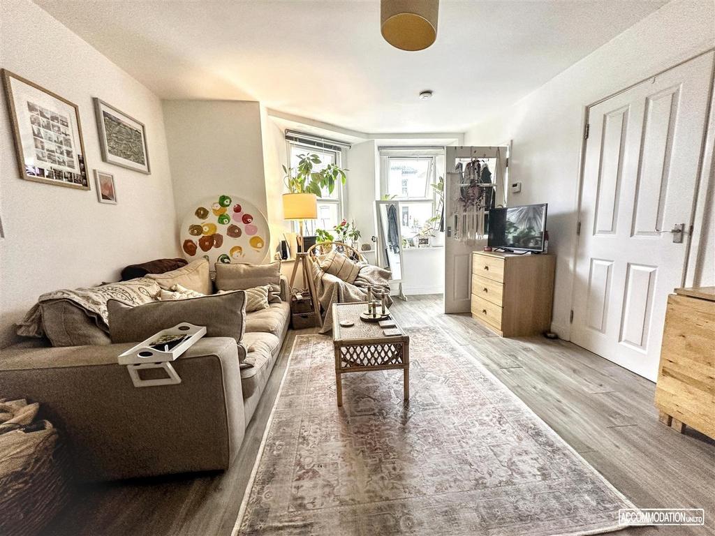 Bright, modern lounge with comfy seating...