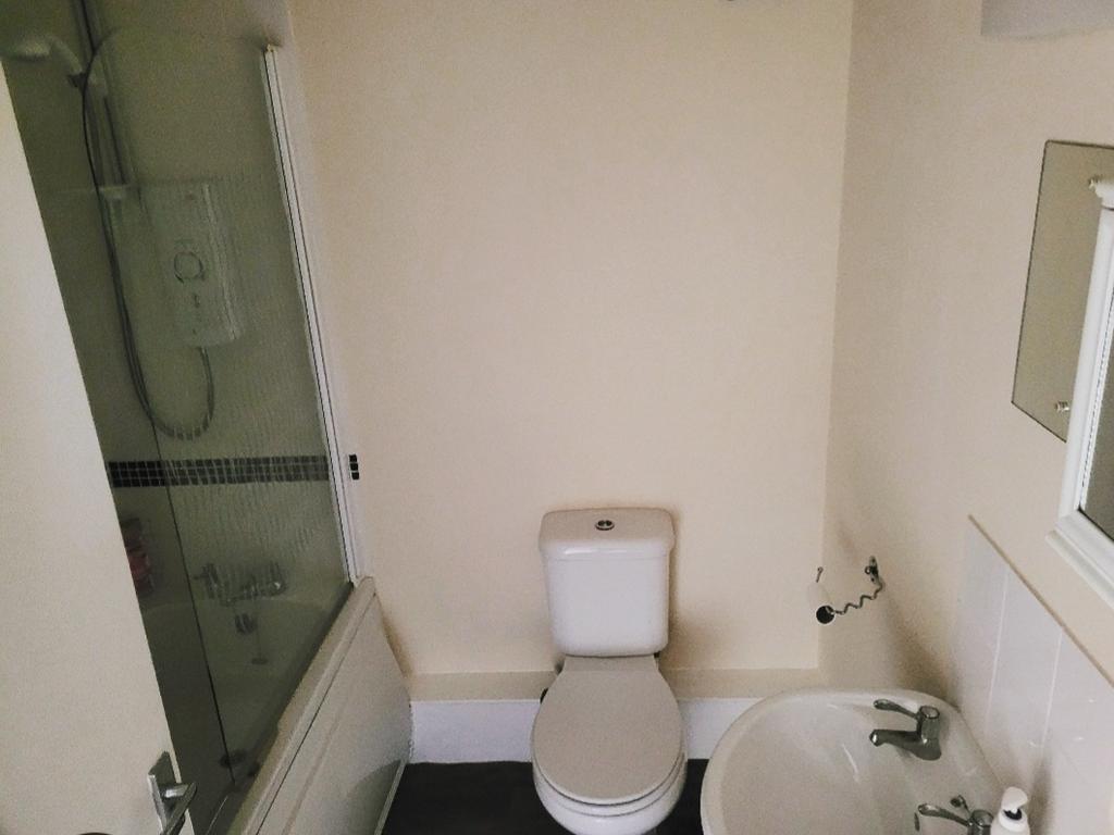 Bathroom - with electric shower over bath