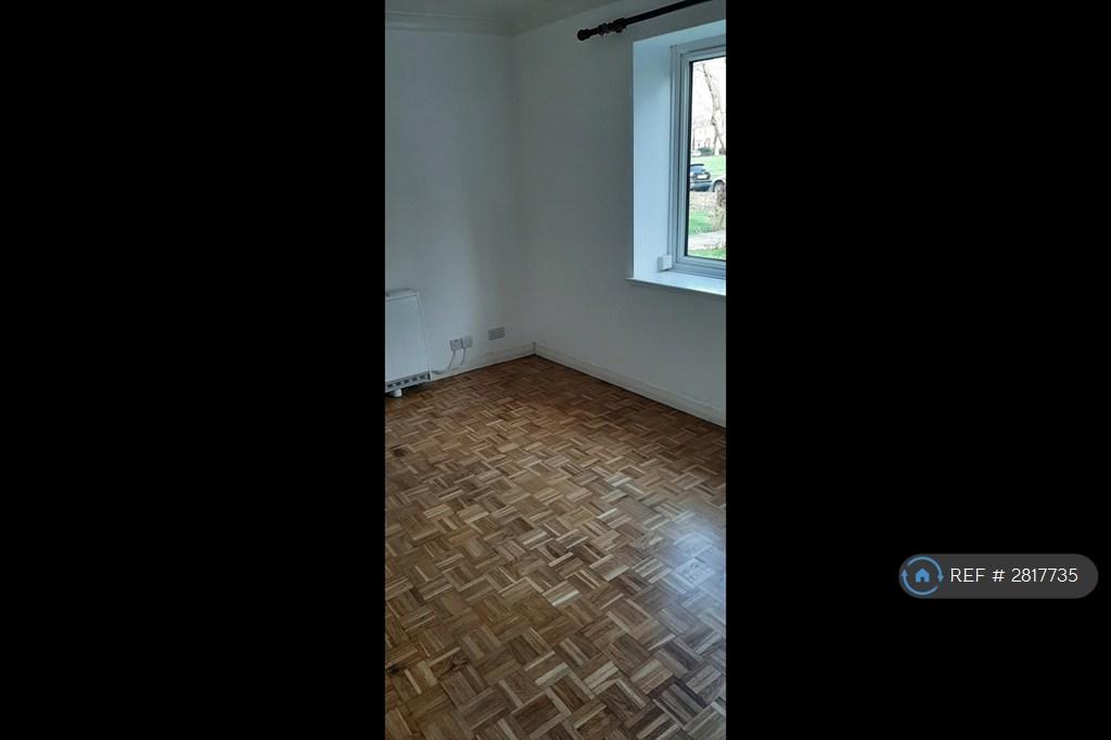 Living Room With Heater And Part Of The Window