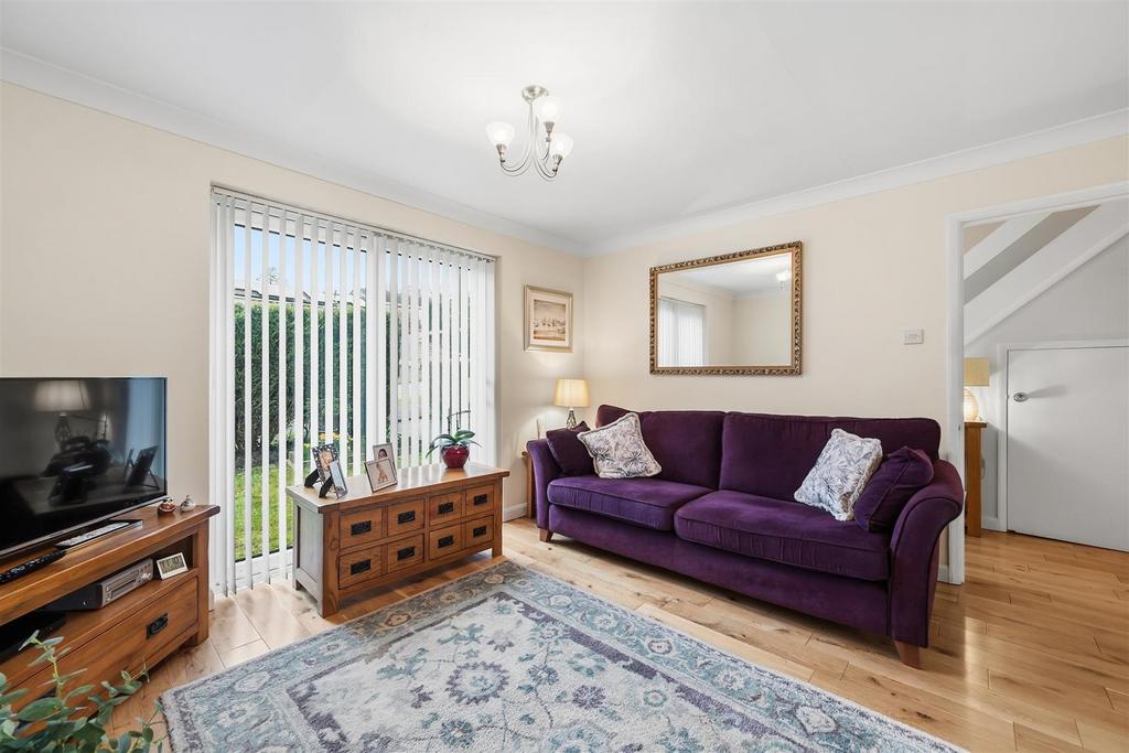 Sitting Room to hallway and patio doors.jpg
