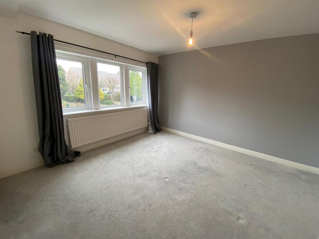 BEDROOM FRONT LEFT.jpg
