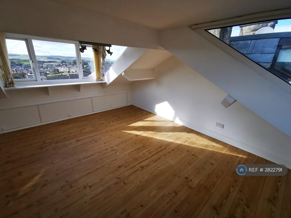 Attic Room With Expansive Views Front And Rear.