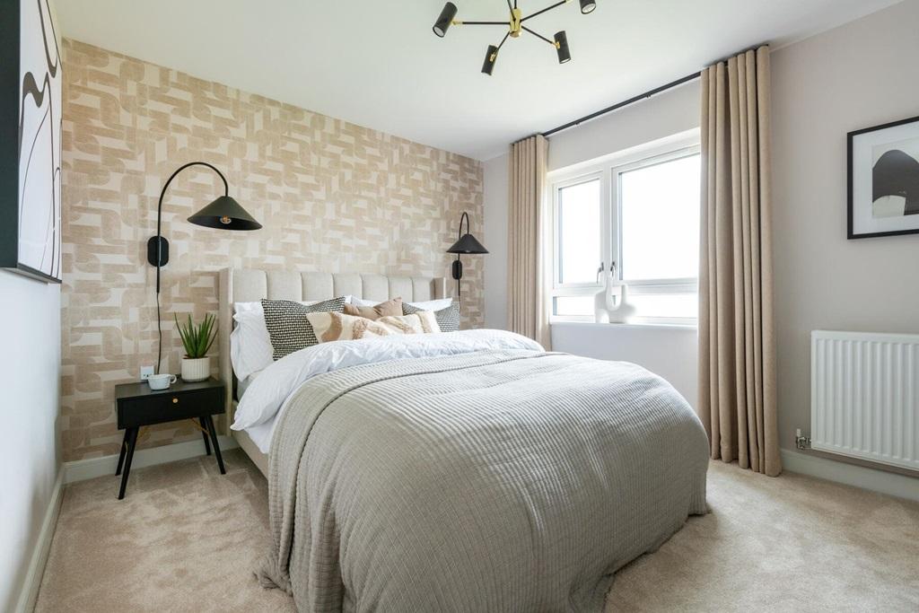 The king-size main bedroom has ample storage space