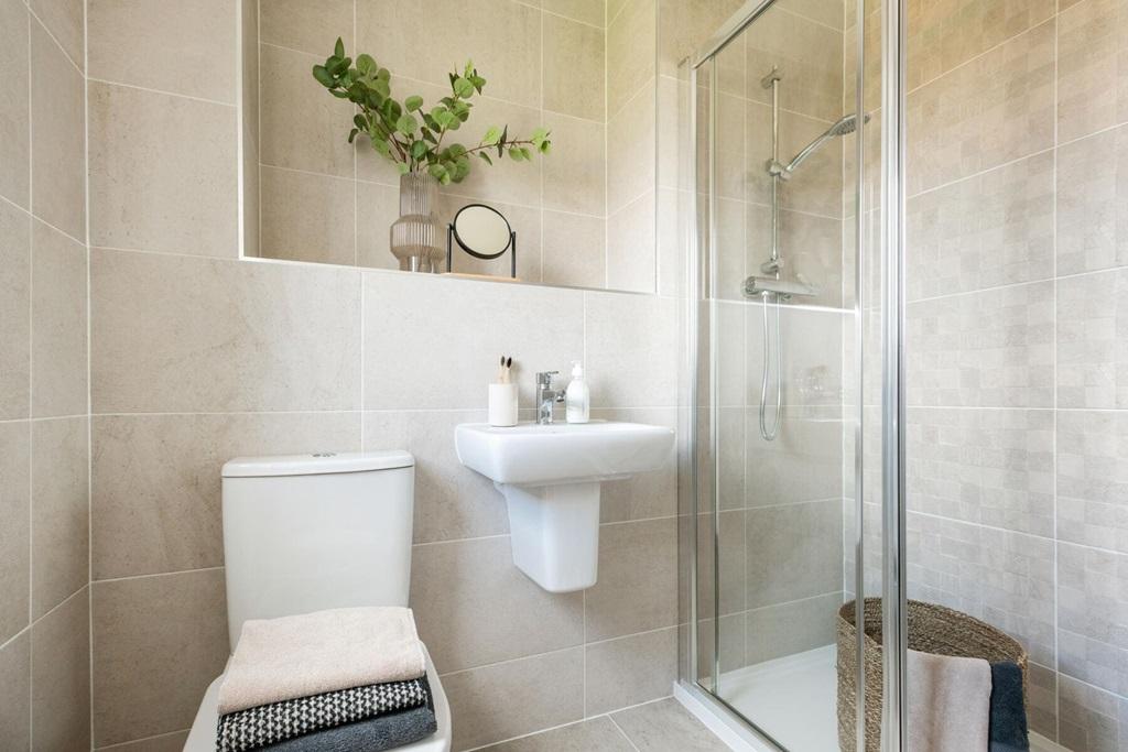 En-suite shower room away from the family