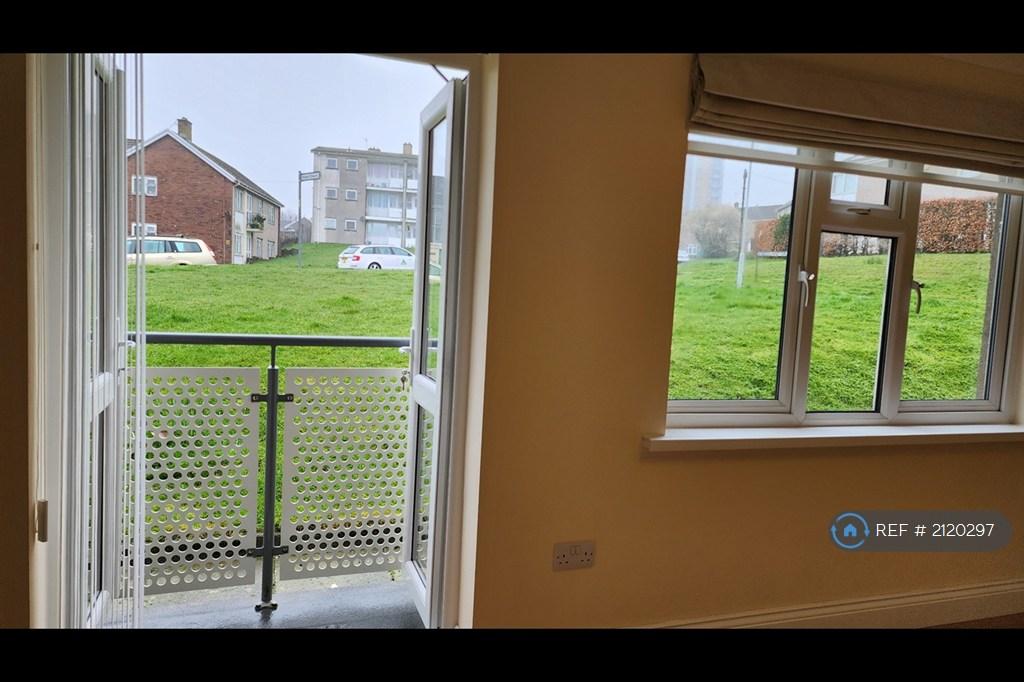 Lounge Has French Doors And Balcony