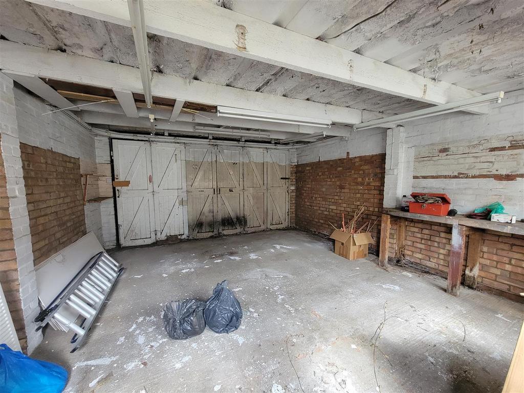 Double garage to rear
