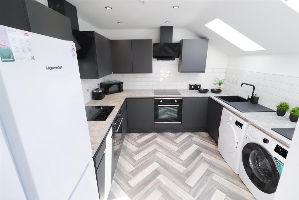 Modern fitted kitchen with appliances...