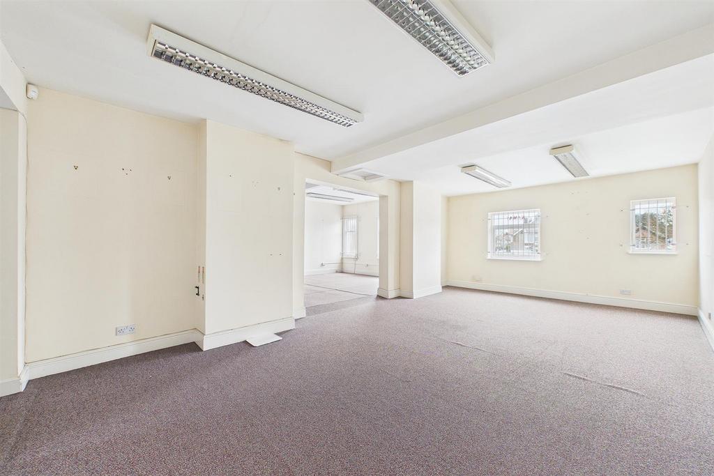 Bright, flexible open-plan workspace with neutr...