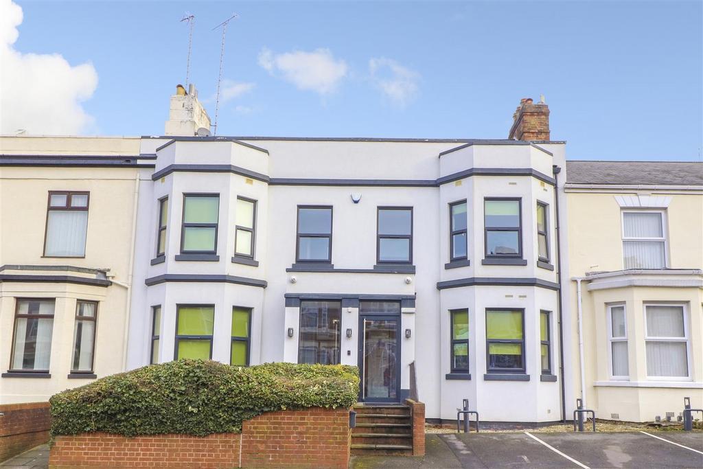 Attractive white-fronted terraced house with ba...