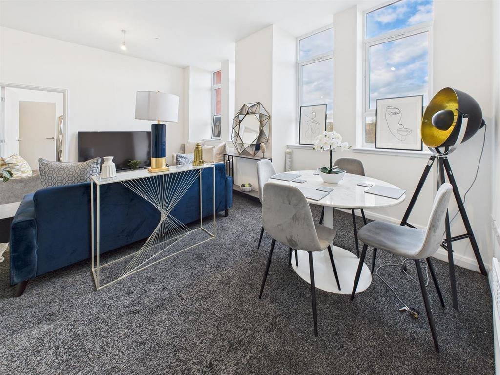 Bright modern living area with dining space...