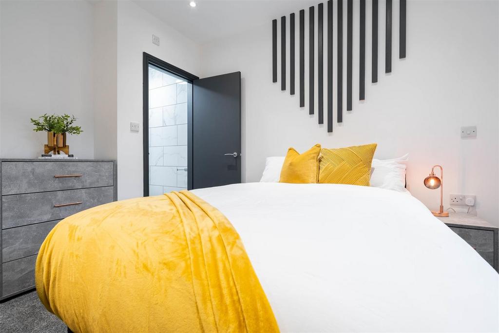 Bright, stylish bedroom with cosy bed and decor...