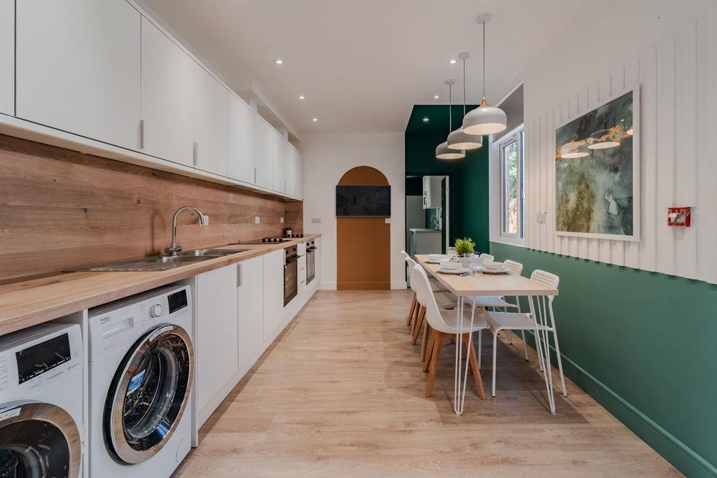 Modern communal kitchen with dining area...