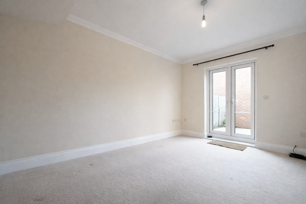 Emptylivingroomwithfrenchdoors