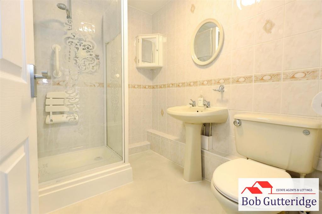 Fully tiled shower room