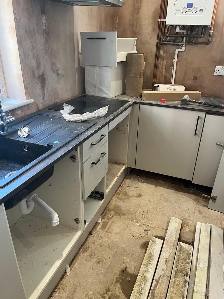 Kitchen and view of boiler.jpeg