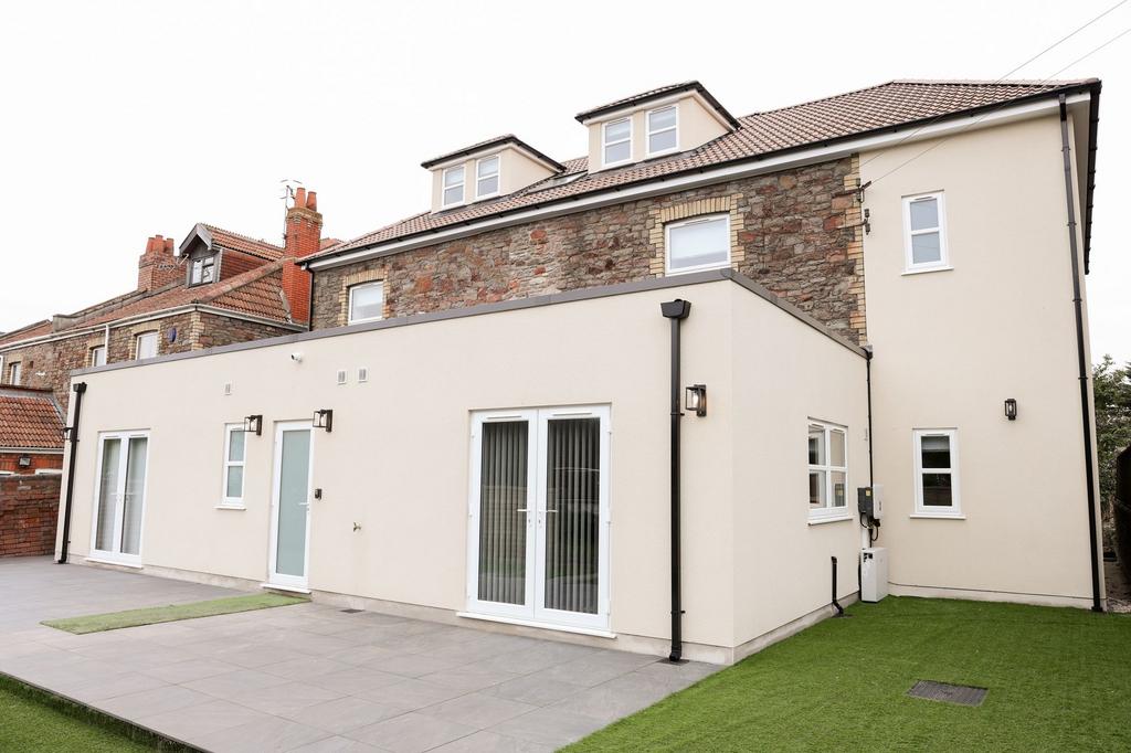 Modern semi with stone detail and patio...