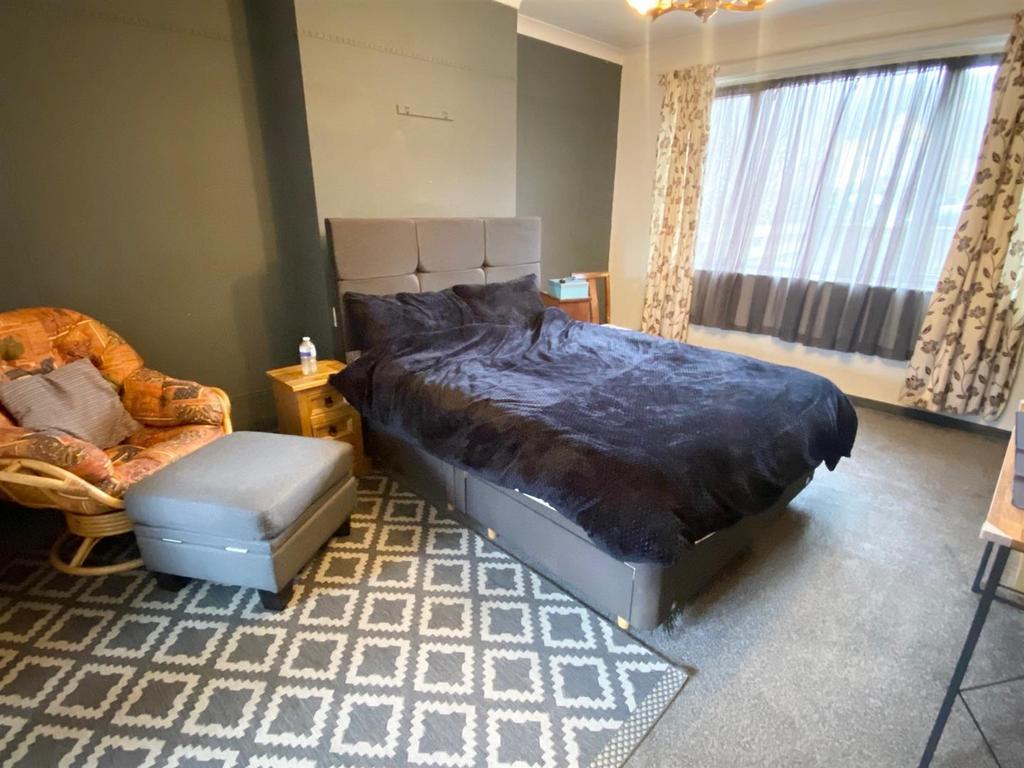 Lounge used as bedroom by tenant.jpg